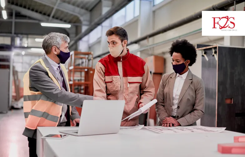 Group of men working on a process called kaisos progress